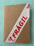 Caderno Frágil - Pautado