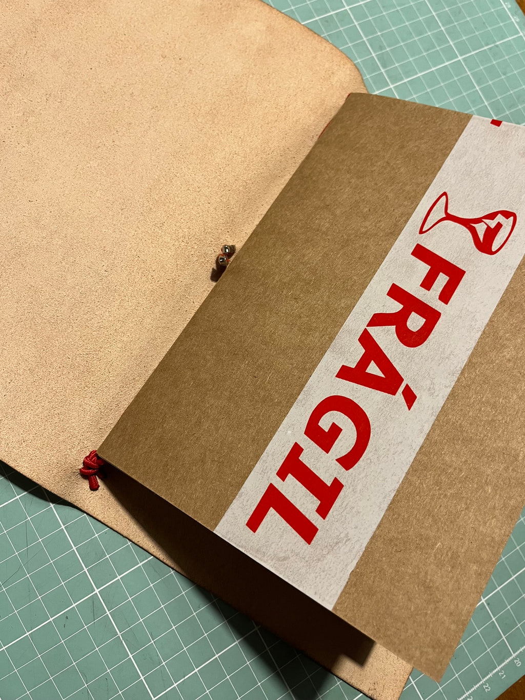 Caderno Frágil
